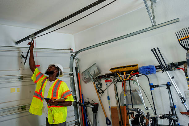Professional Garage Door Panel Replacement technician working in Canfield, OH